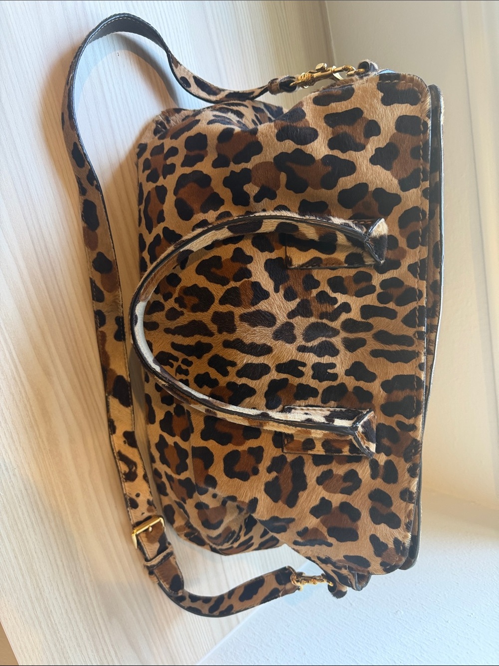 “THE ORIGINAL CAR SHOE” luxury leopard calf hair handbag by the Prada Group